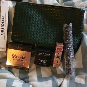 Bundle of makeup items plus makeup bag